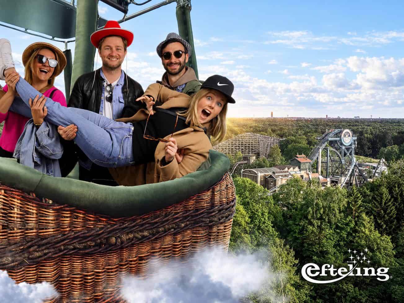 People on a picture in a balloon above the Efteling